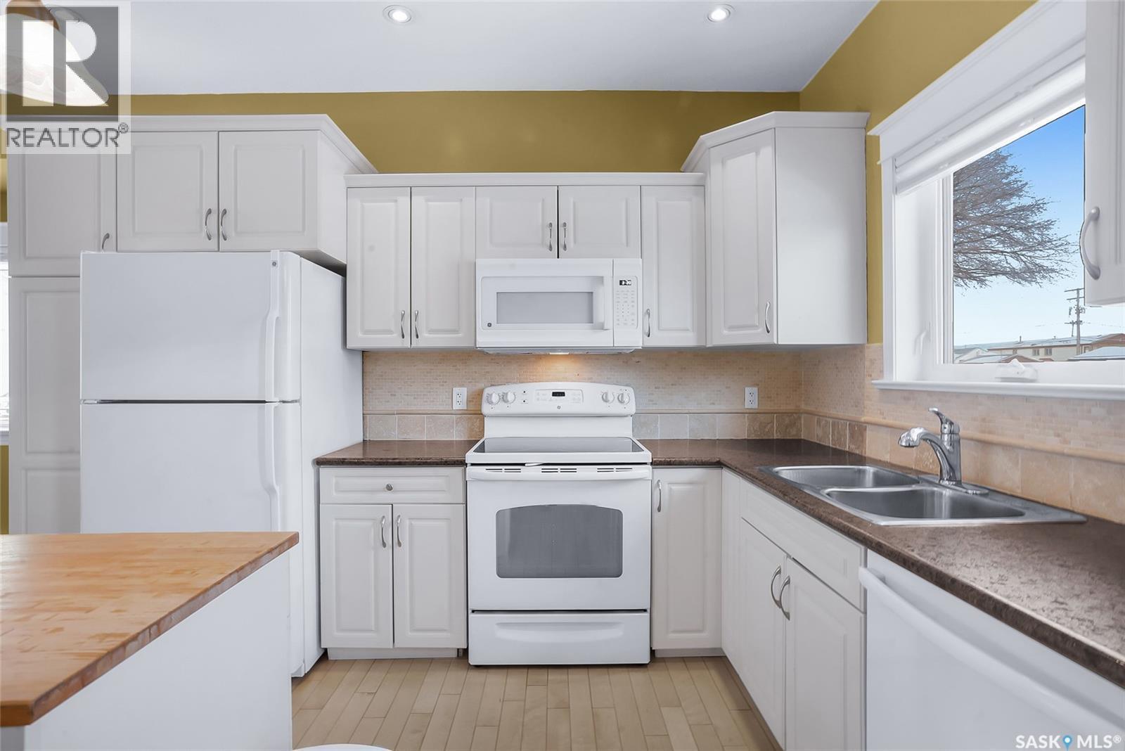 801 1St Avenue, Rosthern, SK - Indoor Photo Showing Kitchen With Double Sink
