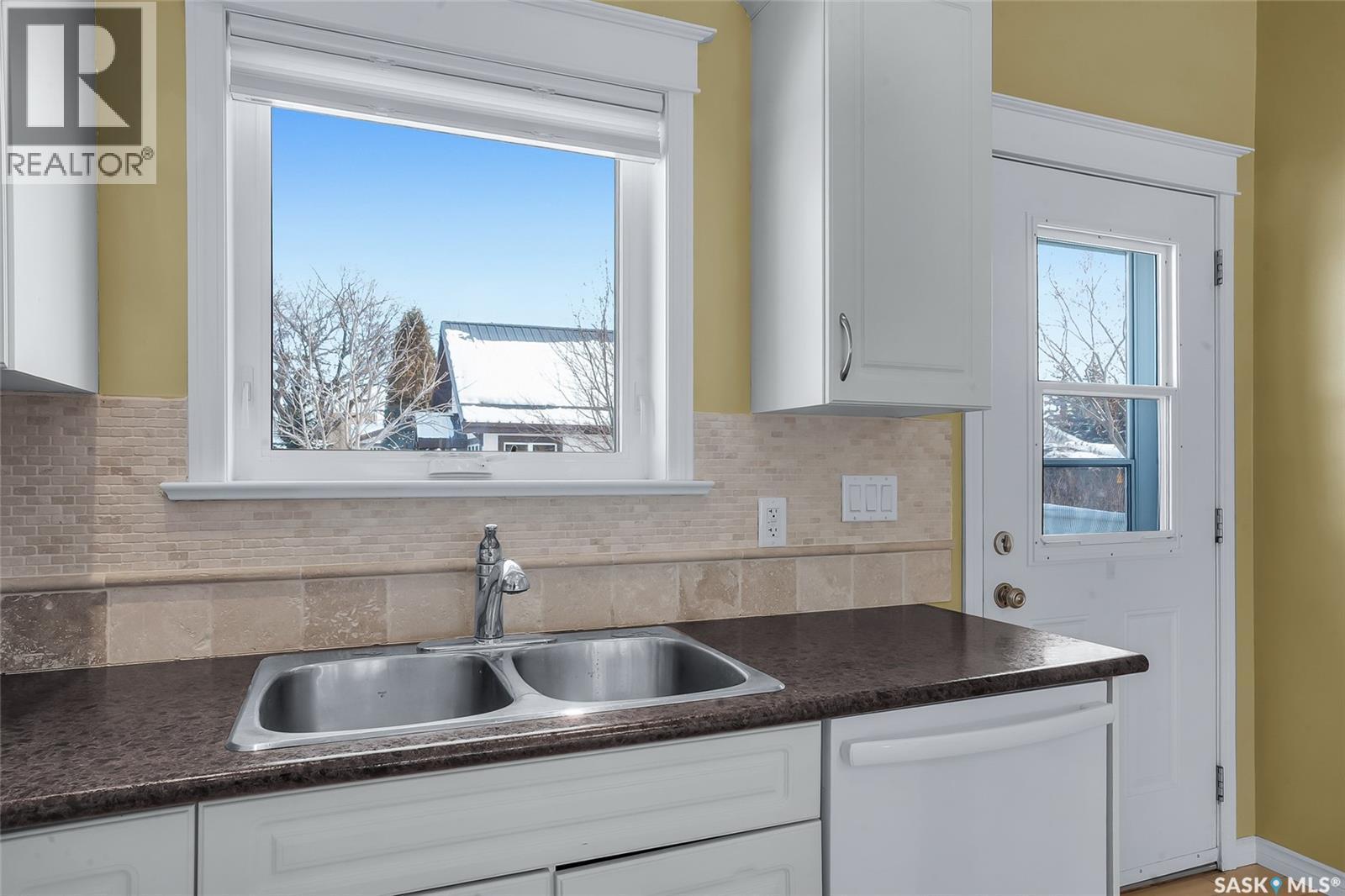 801 1St Avenue, Rosthern, SK - Indoor Photo Showing Kitchen With Double Sink