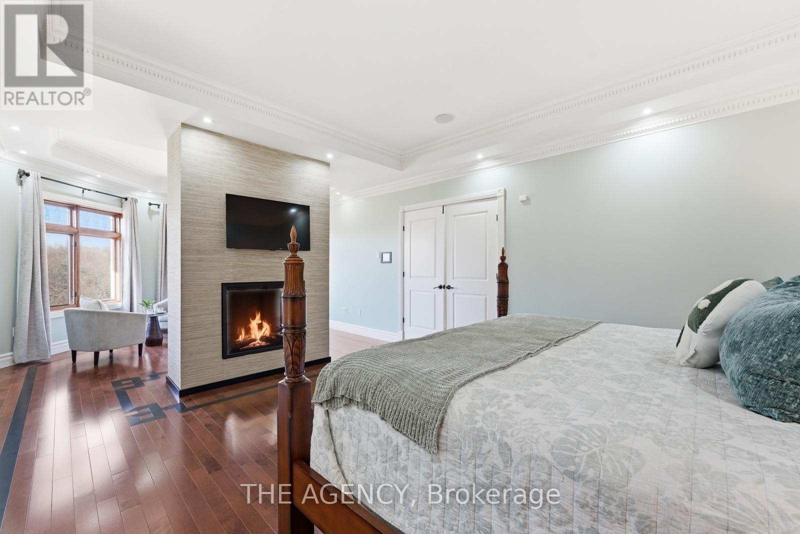 2659 2 Sideroad, Burlington, ON - Indoor Photo Showing Bedroom With Fireplace