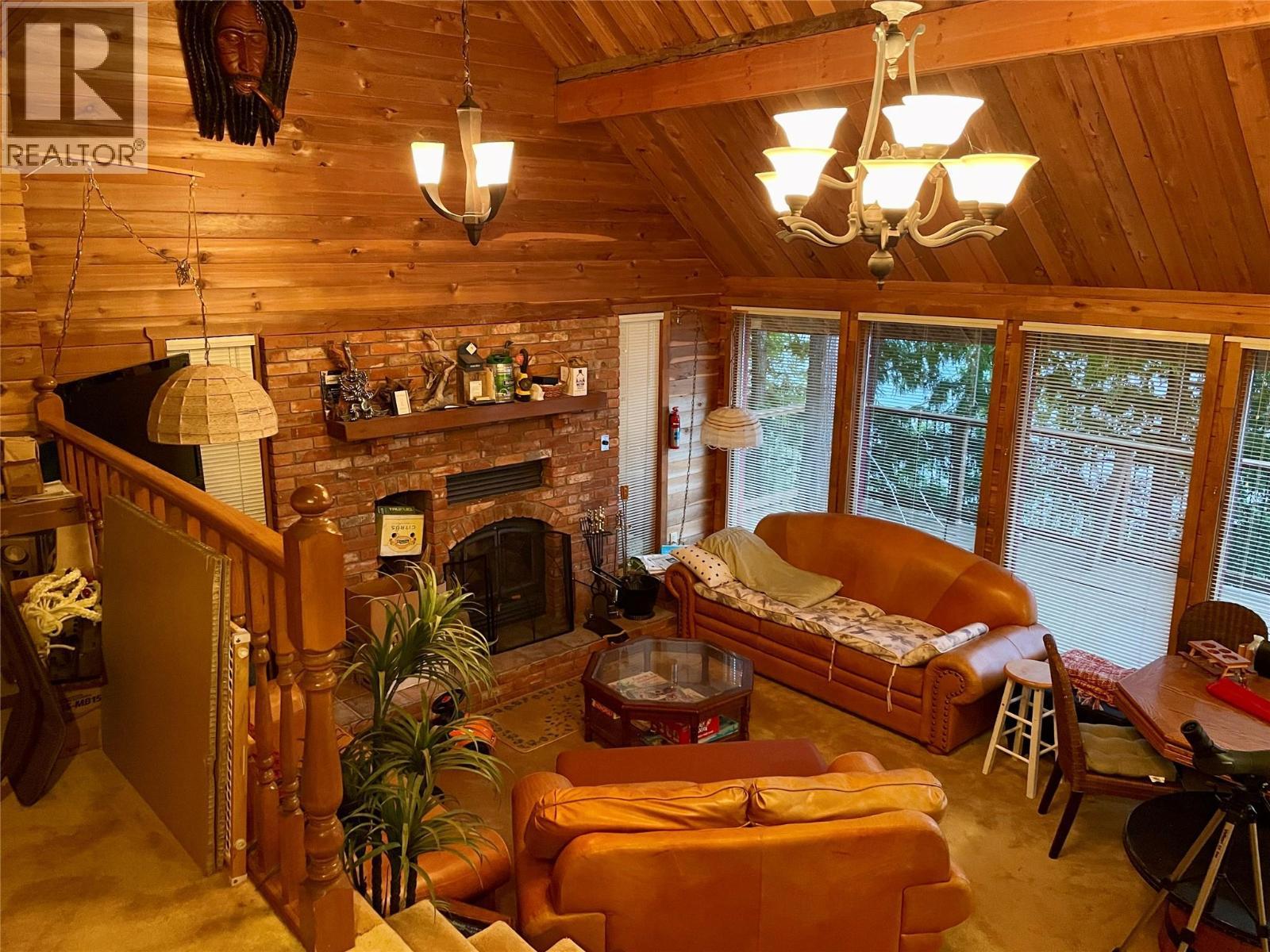 31 Lime Cliffs Beach, Sicamous, BC - Indoor With Fireplace