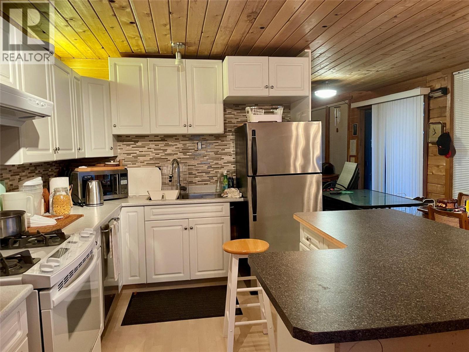 31 Lime Cliffs Beach, Sicamous, BC - Indoor Photo Showing Kitchen
