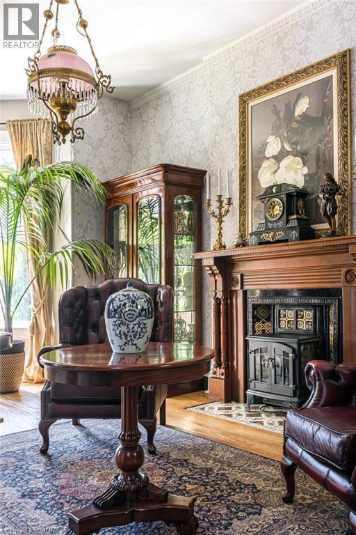 122 East Avenue S, Hamilton, ON - Indoor Photo Showing Living Room With Fireplace