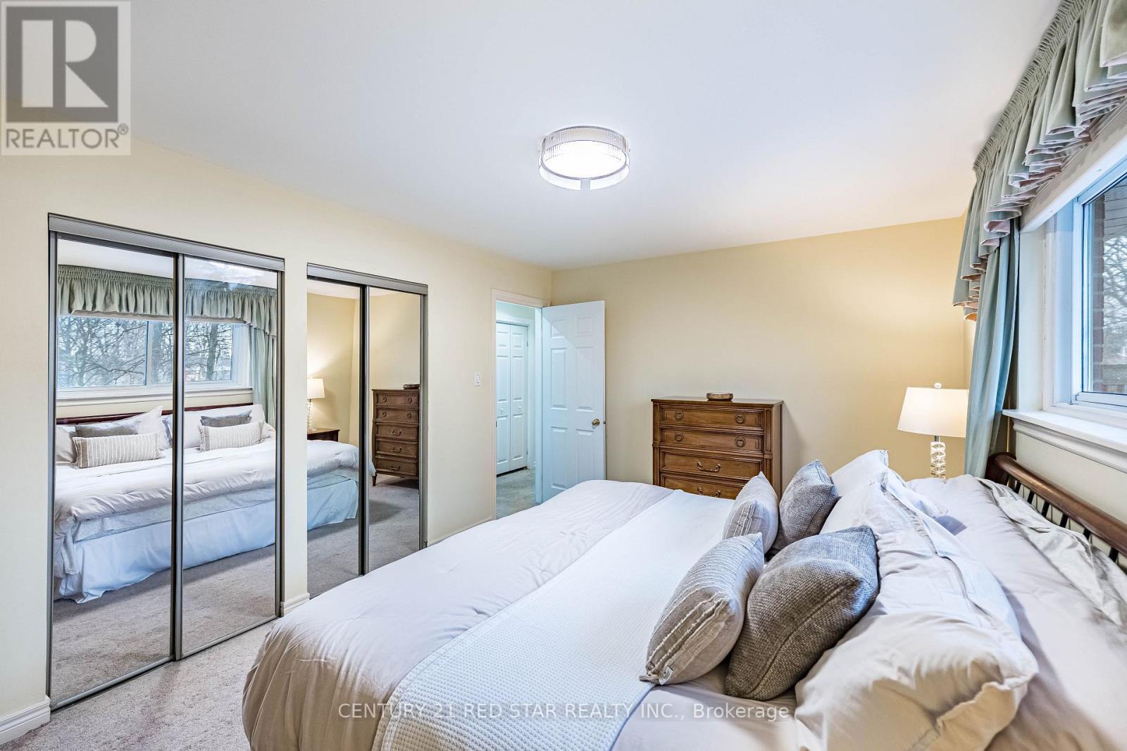 Primary Double Closets - 25 Devonshire Drive, Brampton, ON - Indoor Photo Showing Bedroom