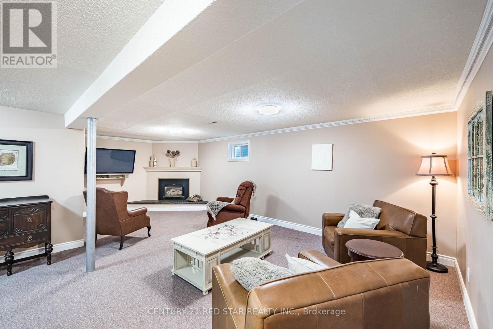 Family Area In Basement - 25 Devonshire Drive, Brampton, ON - Indoor With Fireplace