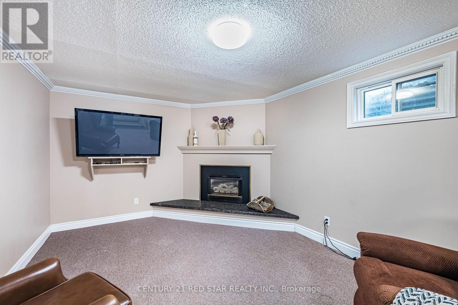 Could Be A Great Home Theatre Area - 25 Devonshire Drive, Brampton, ON - Indoor Photo Showing Living Room With Fireplace