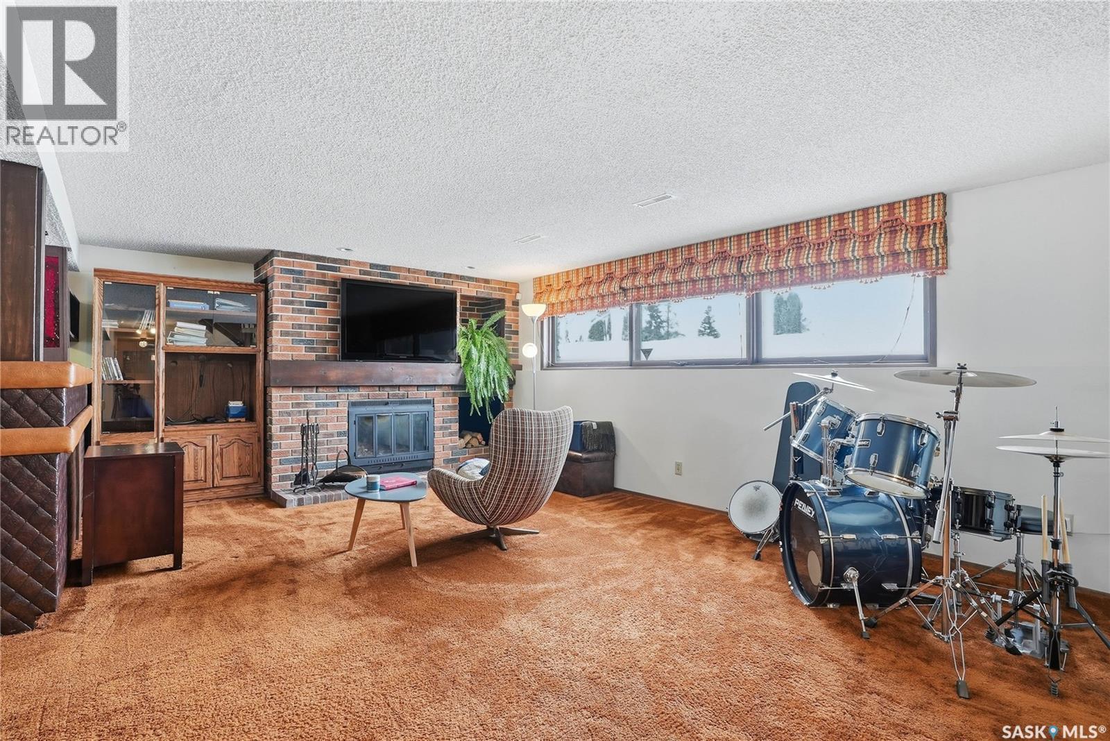 743 Coppermine Crescent, Saskatoon, SK - Indoor With Fireplace