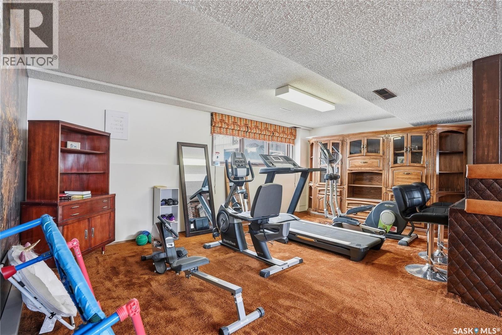 743 Coppermine Crescent, Saskatoon, SK - Indoor Photo Showing Gym Room
