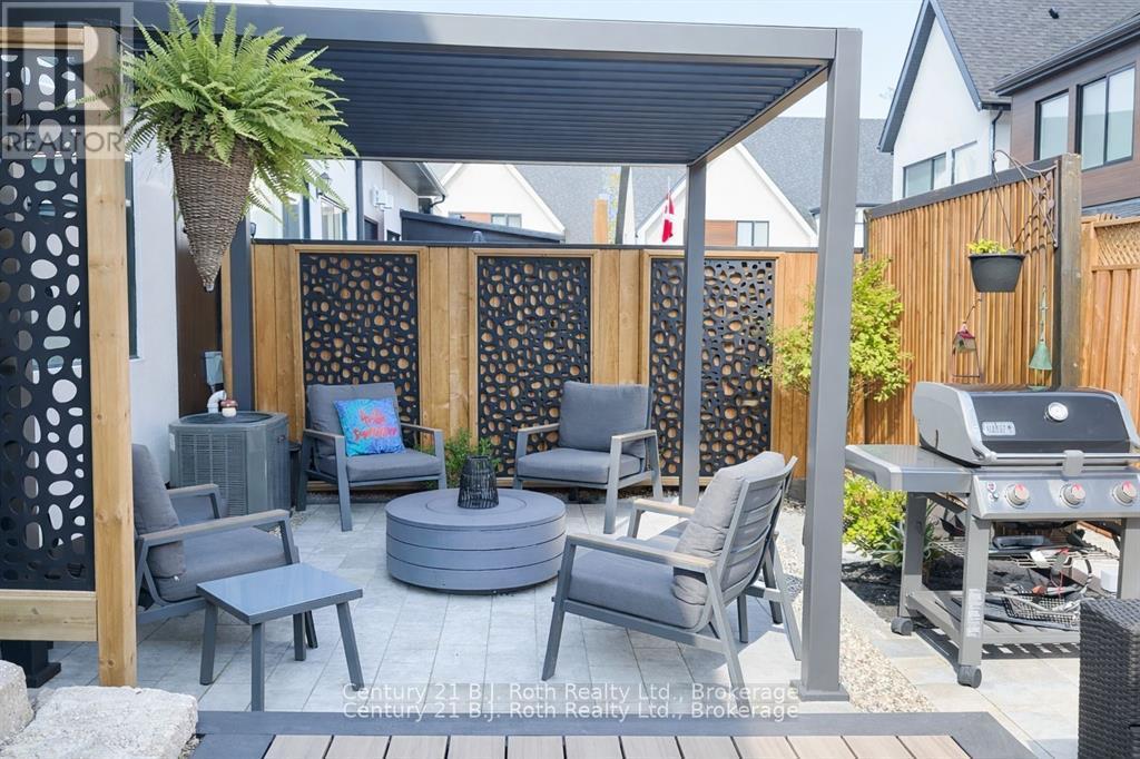 beautifully stonescaped backyard - 34 Ruby Crescent, Orillia, ON - Outdoor With Deck Patio Veranda