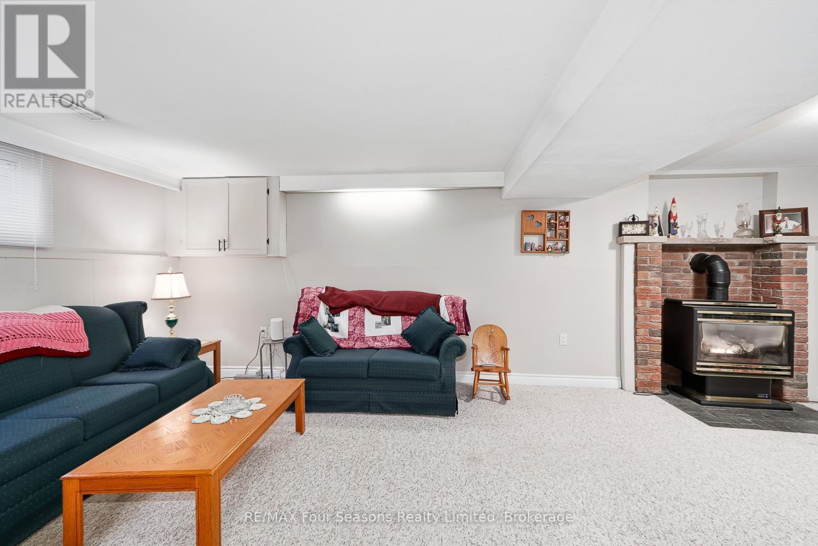 218 Datas Drive, Clearview (Stayner), ON - Indoor Photo Showing Living Room With Fireplace