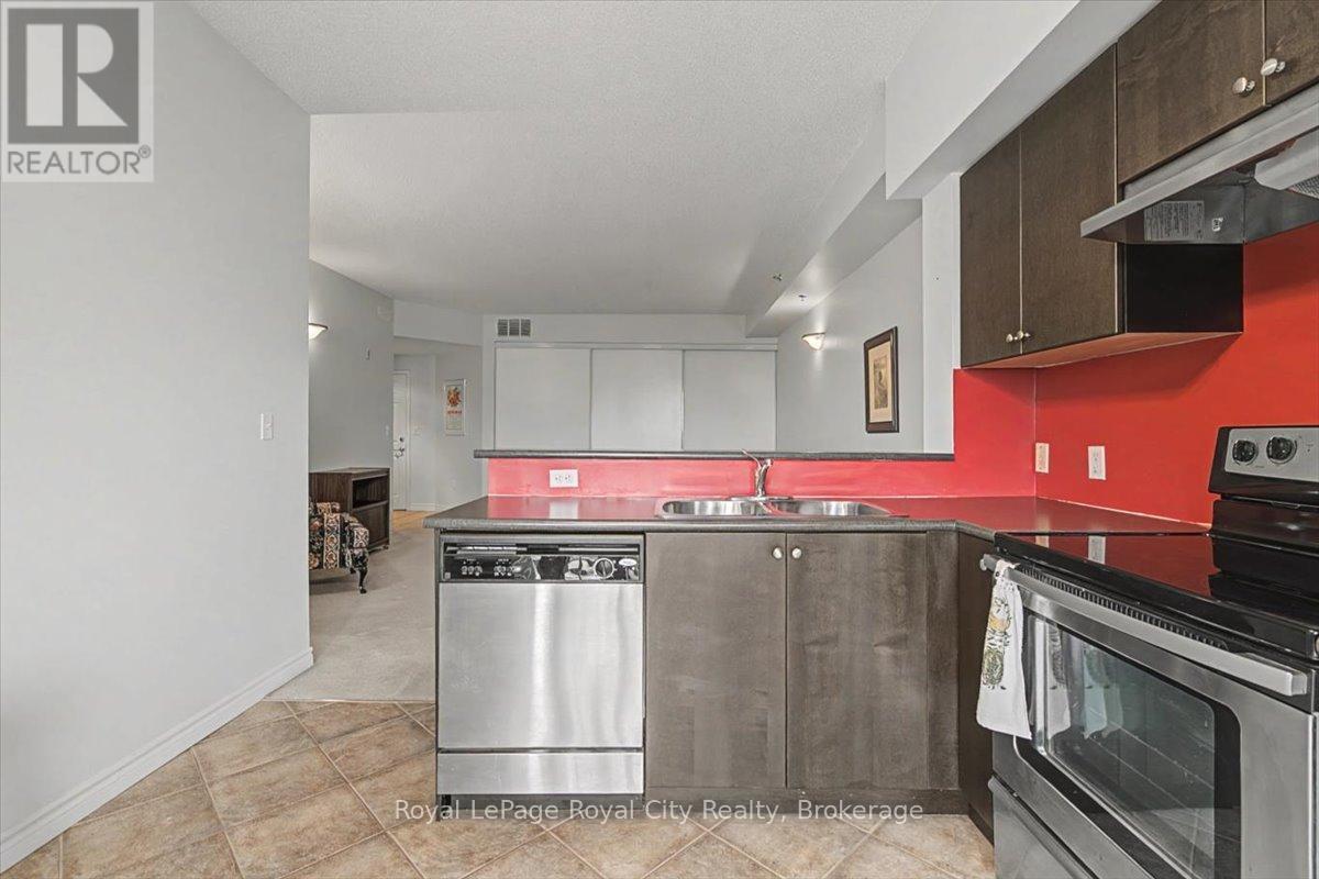 412 - 308 Watson Parkway N, Guelph (Grange Road), ON - Indoor Photo Showing Kitchen With Double Sink