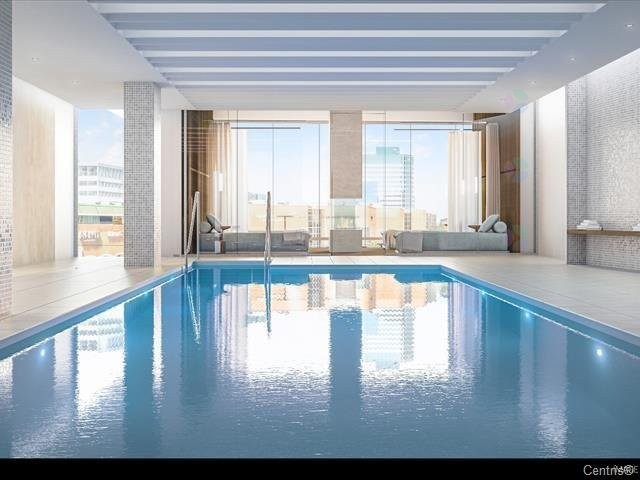 Piscine - 705-1300 Av. De Germain-Des-Prés, Québec (Sainte-Foy/Sillery/Cap-Rouge), QC - Indoor Photo Showing Other Room With In Ground Pool