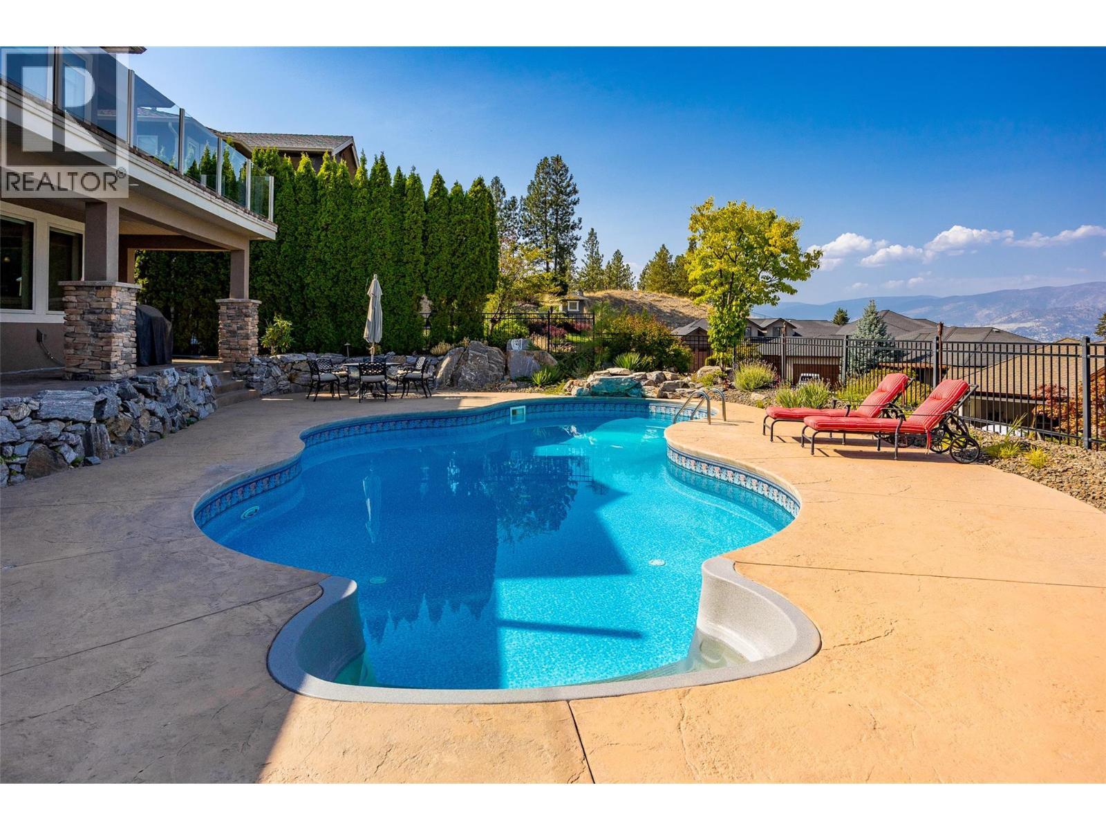 620 Arbor View Drive, Kelowna, BC - Outdoor With In Ground Pool With Deck Patio Veranda With Backyard