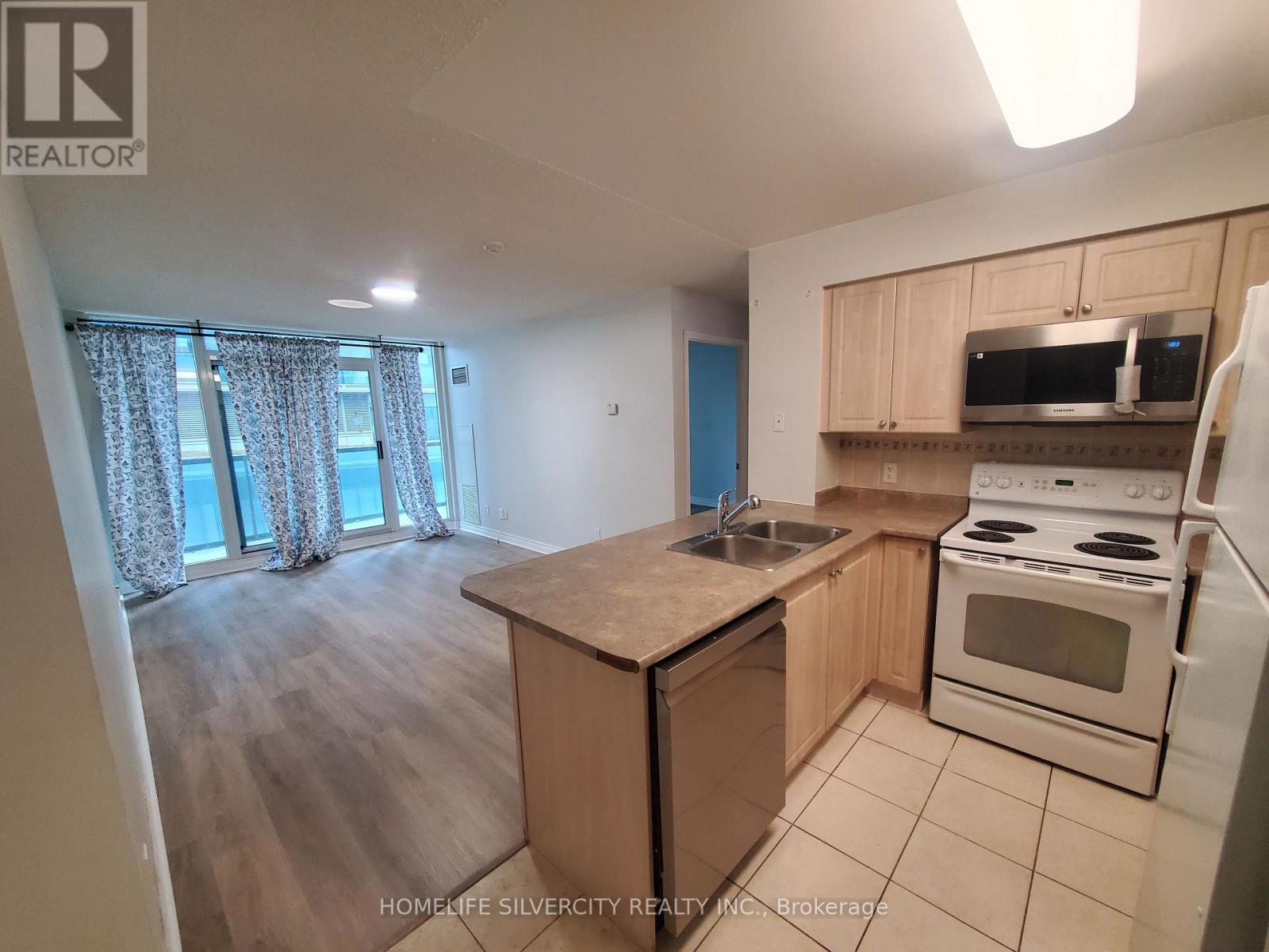 607 - 30 Grand Trunk Crescent, Toronto, ON - Indoor Photo Showing Kitchen With Double Sink