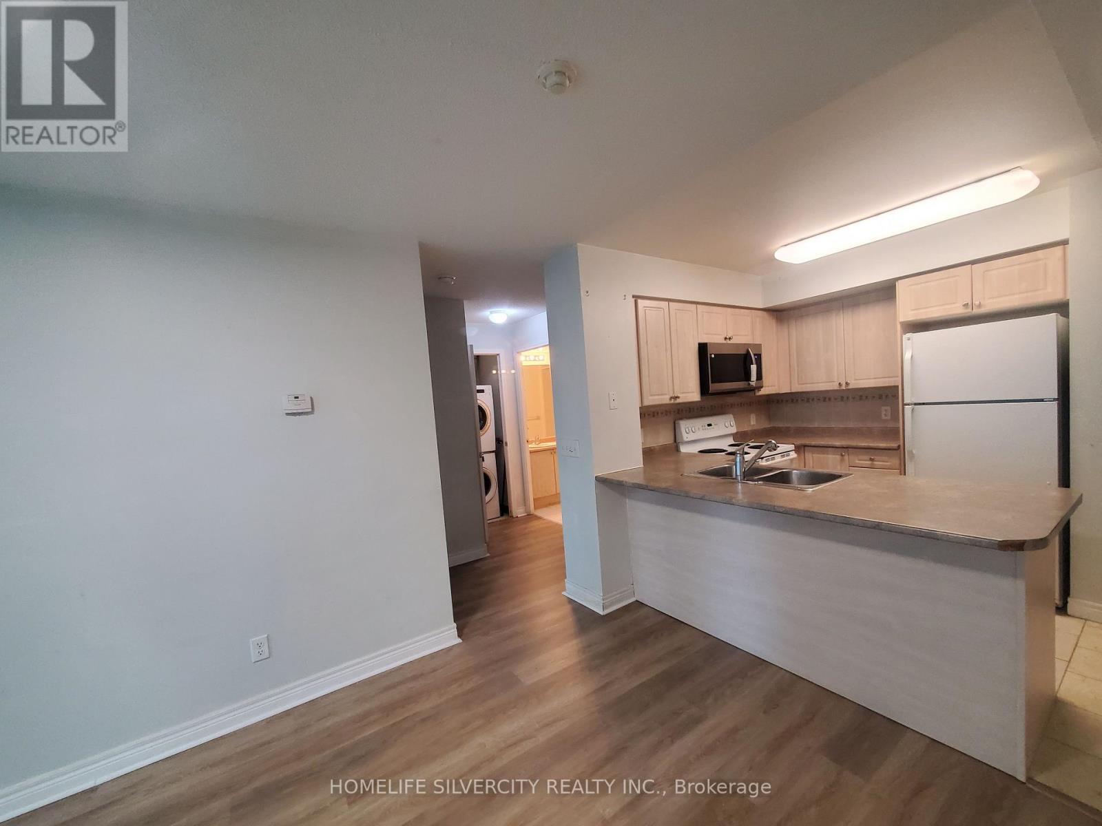 607 - 30 Grand Trunk Crescent, Toronto, ON - Indoor Photo Showing Kitchen With Double Sink