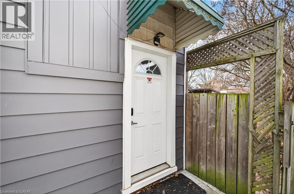 Side entry into the Mudroom/Laundry room & basement - 8 East 23Rd Street, Hamilton, ON - Outdoor With Exterior