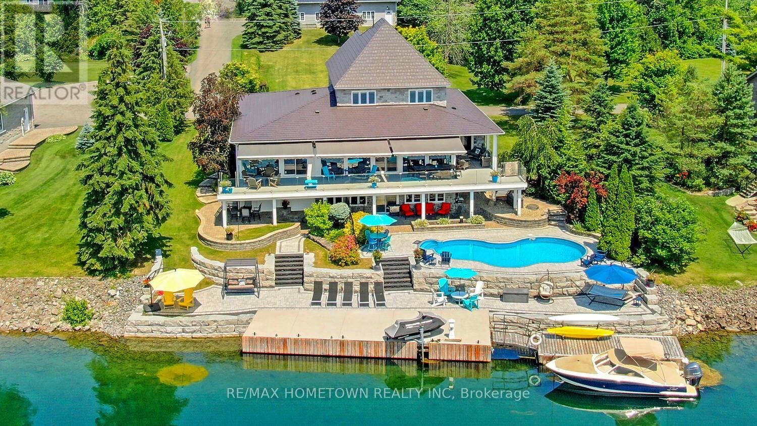 201 Empire Hanna Road E, Edwardsburgh/Cardinal, ON - Outdoor With Body Of Water With In Ground Pool With Deck Patio Veranda