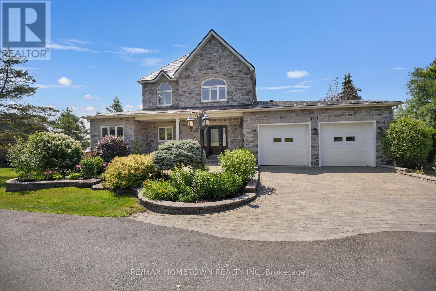 201 Empire Hanna Road E, Edwardsburgh/Cardinal, ON - Outdoor With Deck Patio Veranda With Facade