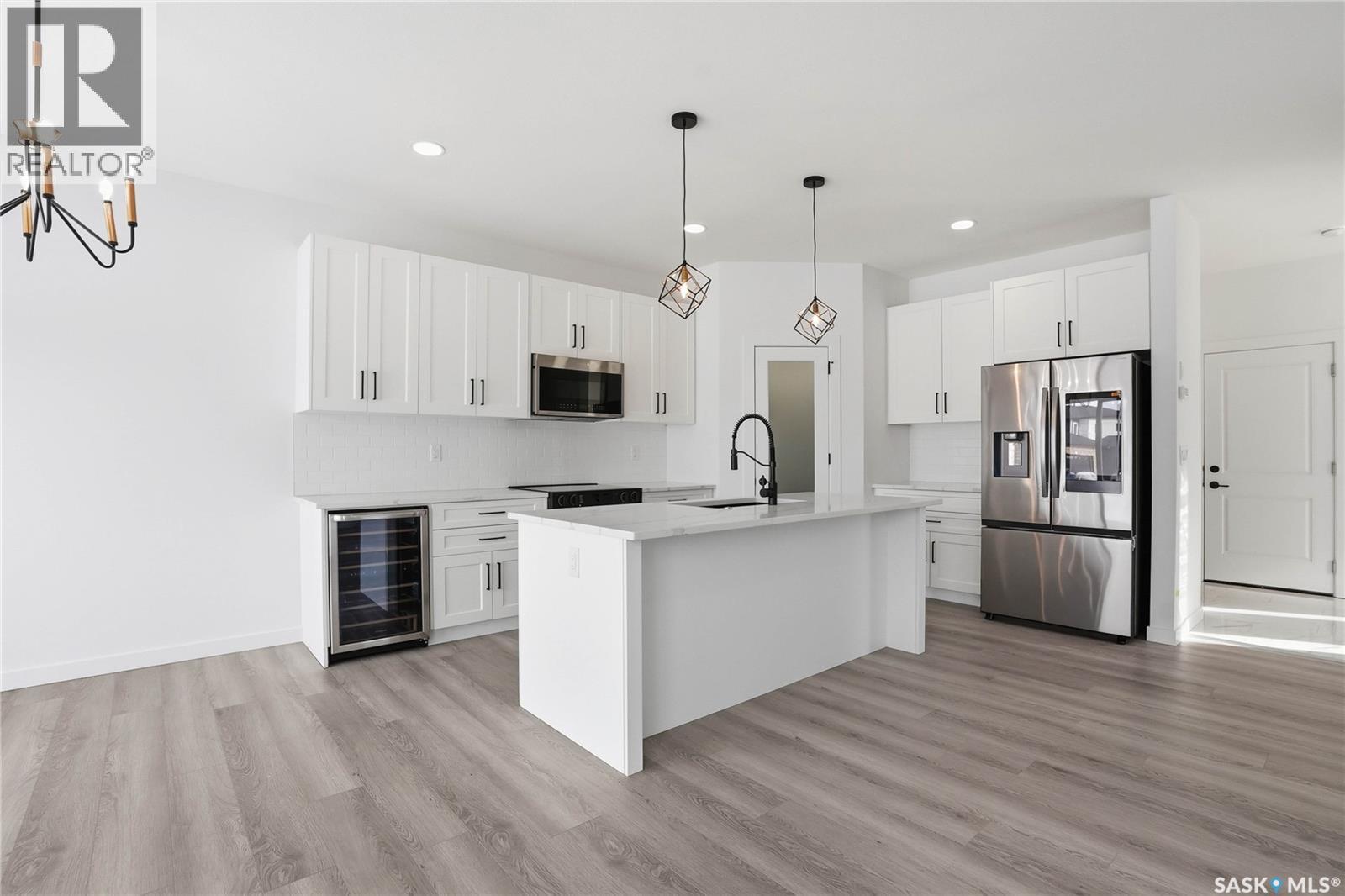 139 Sharma Lane, Saskatoon, SK - Indoor Photo Showing Kitchen With Stainless Steel Kitchen With Upgraded Kitchen