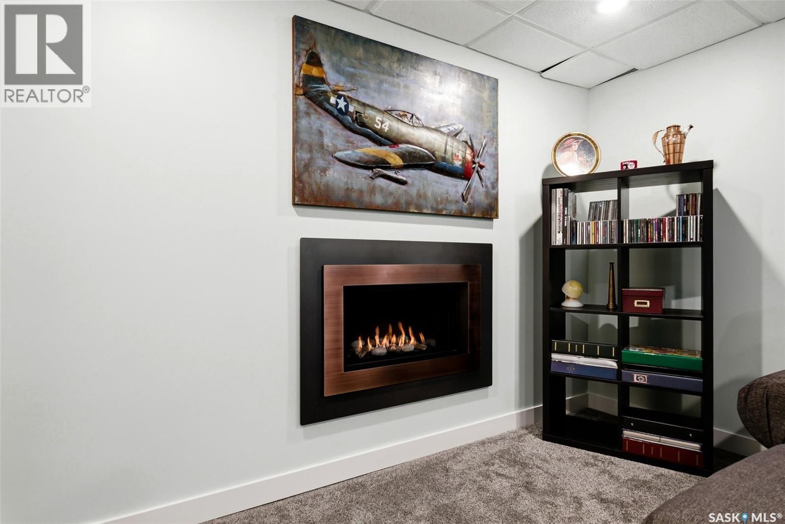 166 Deergrove Crescent, Regina, SK - Indoor With Fireplace