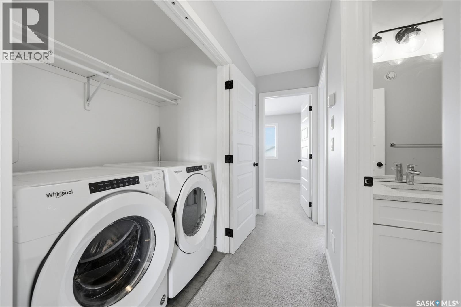 16 1003 Evergreen Boulevard, Saskatoon, SK - Indoor Photo Showing Laundry Room