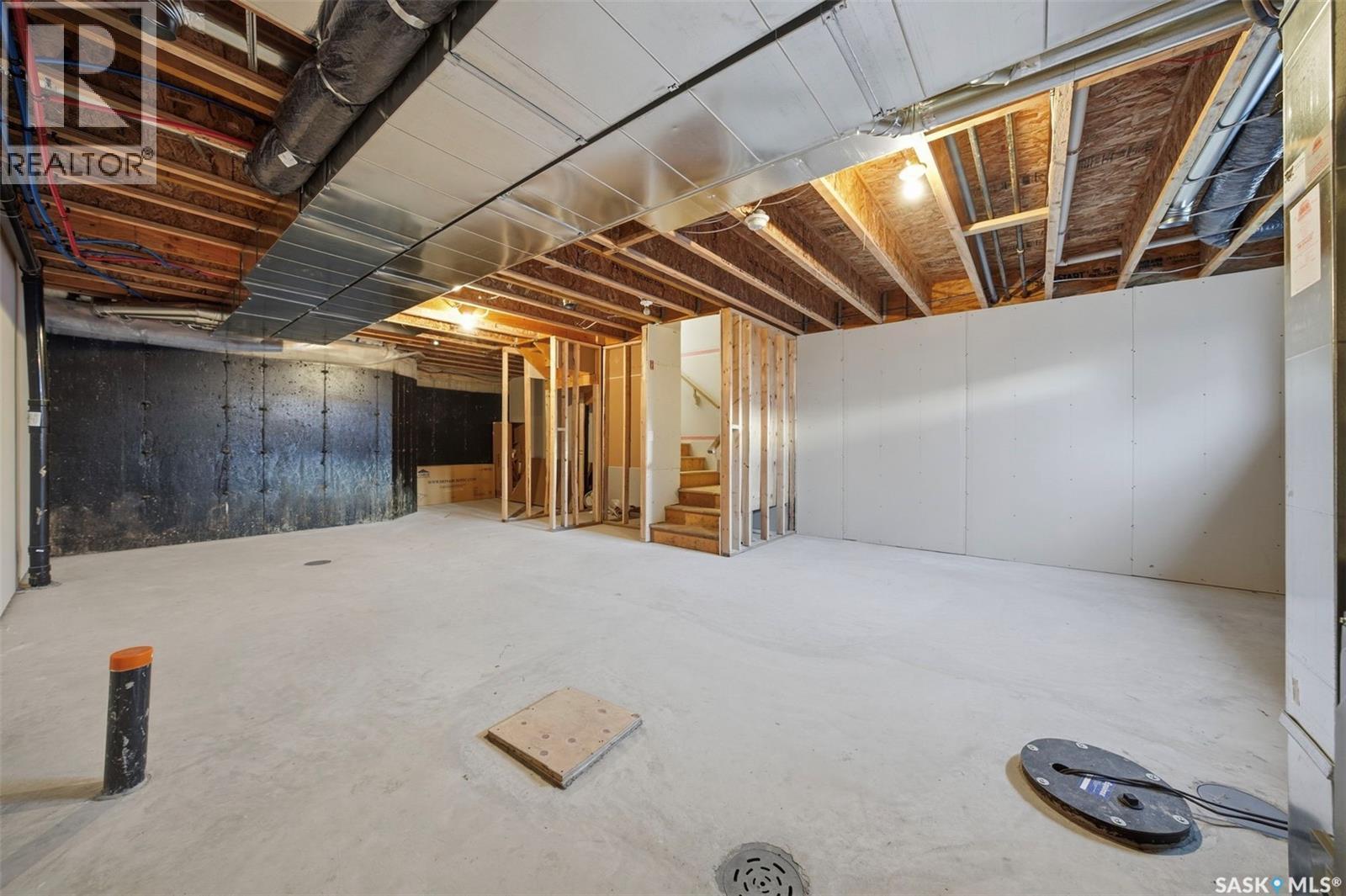 16 1003 Evergreen Boulevard, Saskatoon, SK - Indoor Photo Showing Basement