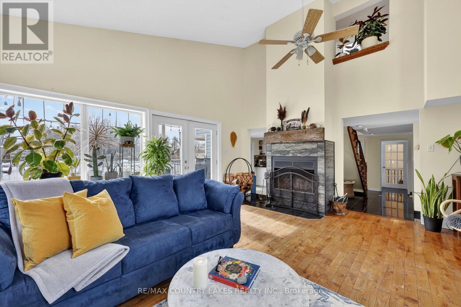 52 Turtle Path, Ramara, ON - Indoor Photo Showing Living Room With Fireplace