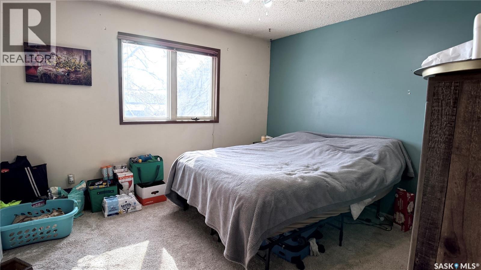 422 Spruce Drive, Estevan, SK - Indoor Photo Showing Bedroom