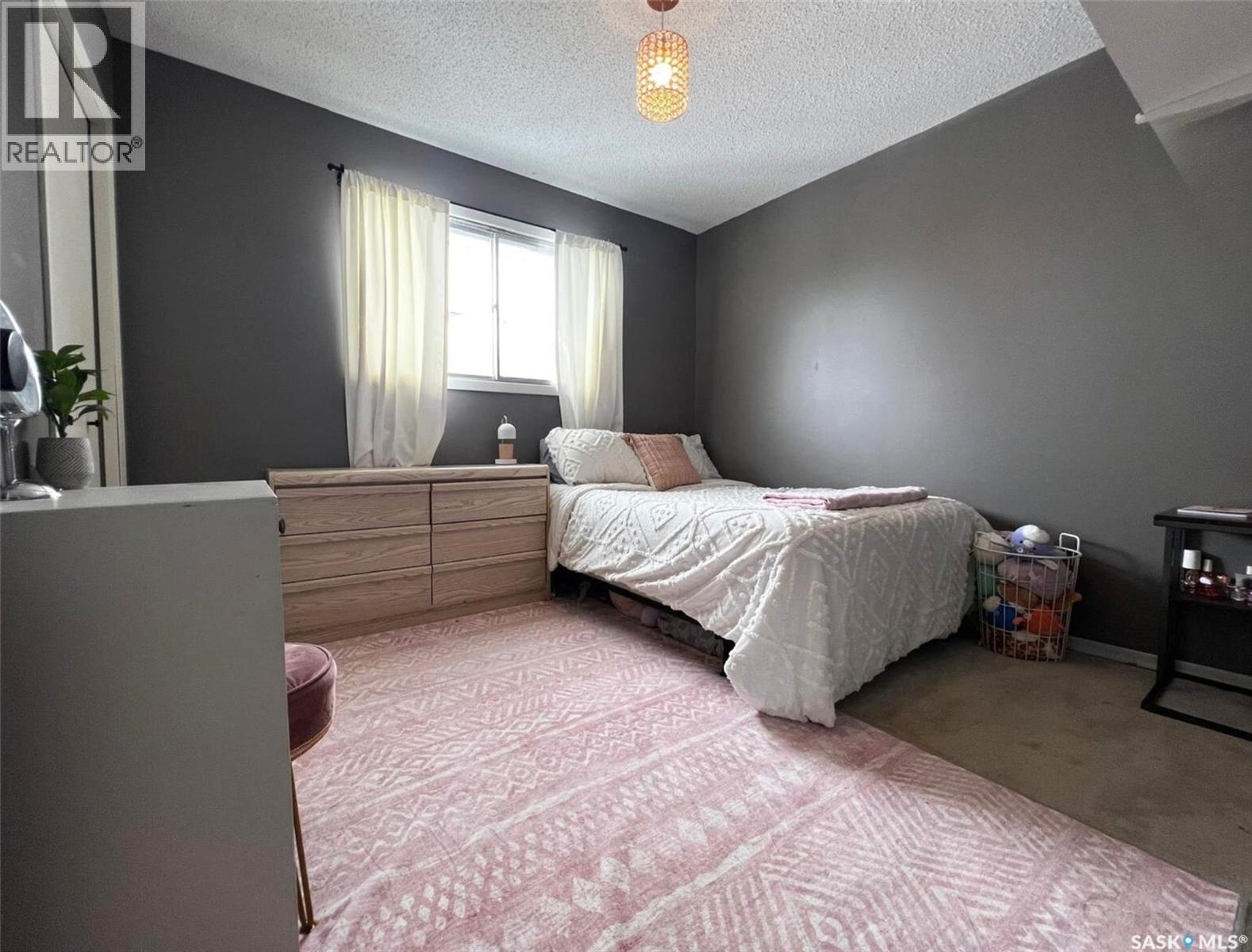 119 Macdonald Place, Swift Current, SK - Indoor Photo Showing Bedroom