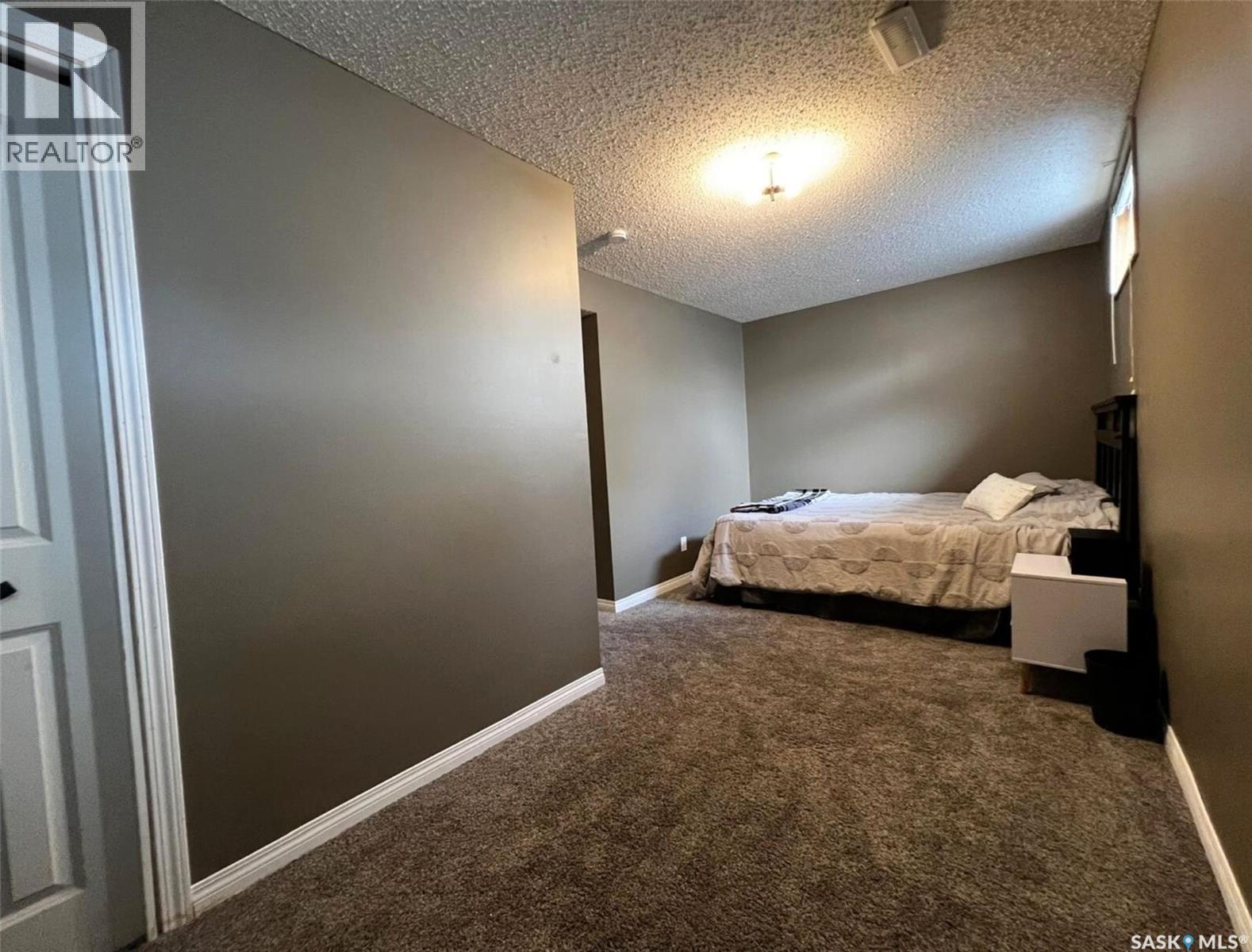 119 Macdonald Place, Swift Current, SK - Indoor Photo Showing Bedroom