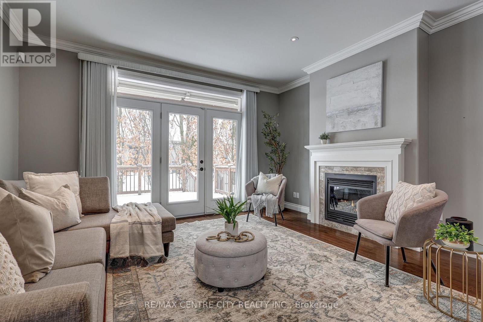101 - 5 Woodhaven Drive, Tillsonburg, ON - Indoor Photo Showing Living Room With Fireplace