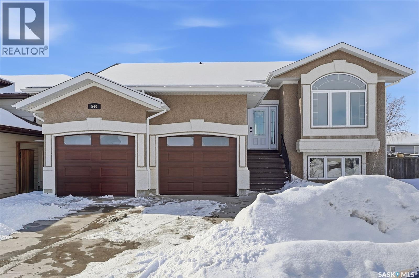 540 Ens Crescent, Warman, SK - Outdoor With Facade