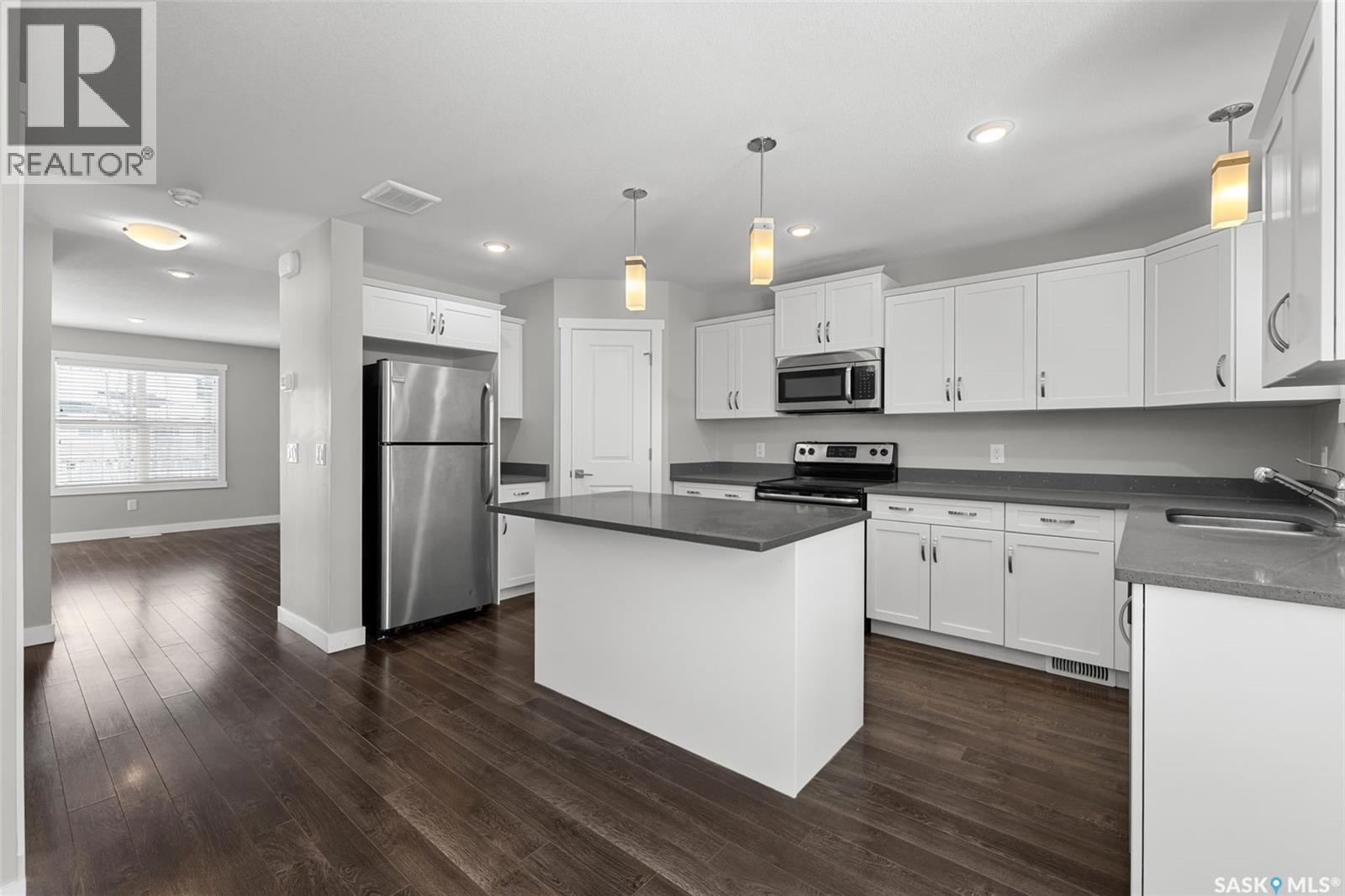 208 1220 Pringle Way, Saskatoon, SK - Indoor Photo Showing Kitchen With Double Sink With Upgraded Kitchen