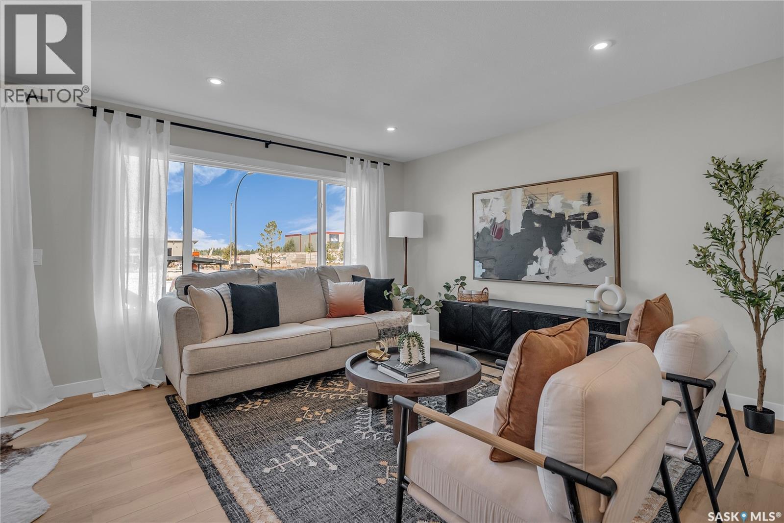 309 155 Mcfaull Way, Saskatoon, SK - Indoor Photo Showing Living Room