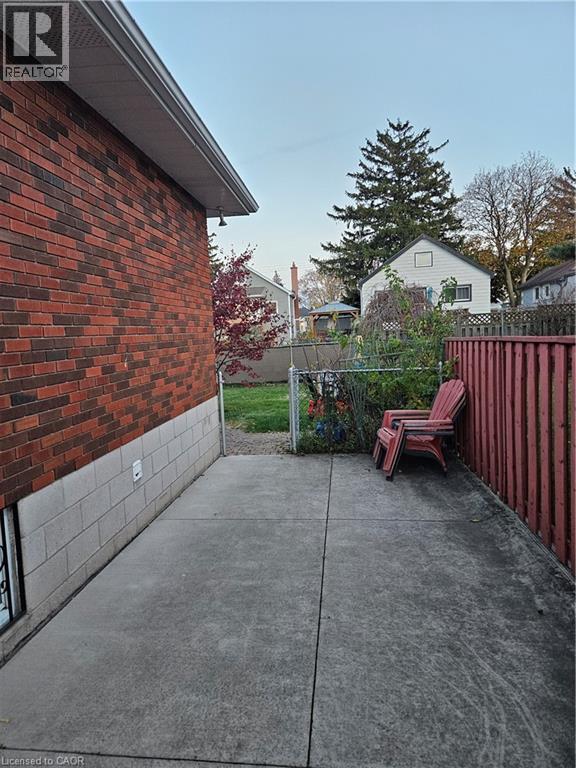 Fenced backyard featuring a patio area - 197 Craigroyston Road, Hamilton, ON - Outdoor