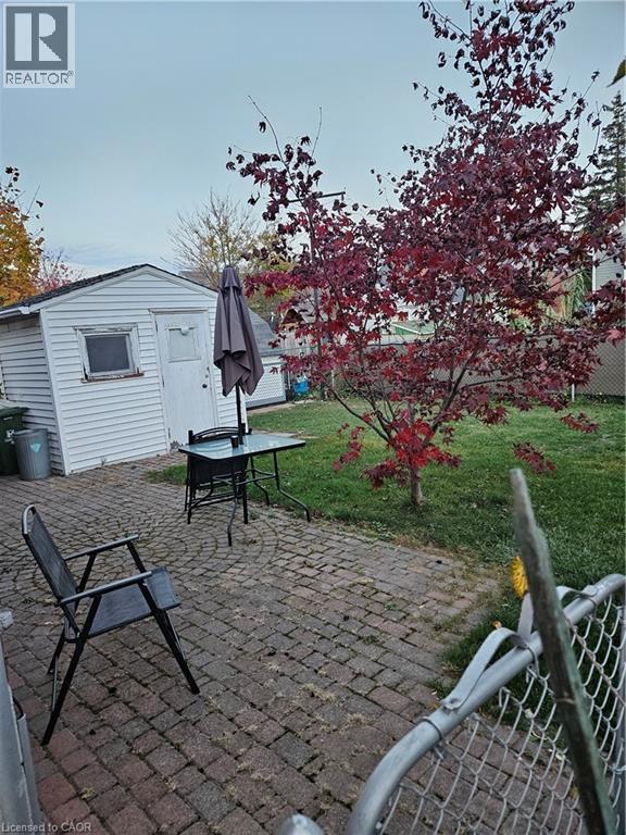 View of patio with an outbuilding - 197 Craigroyston Road, Hamilton, ON - Outdoor