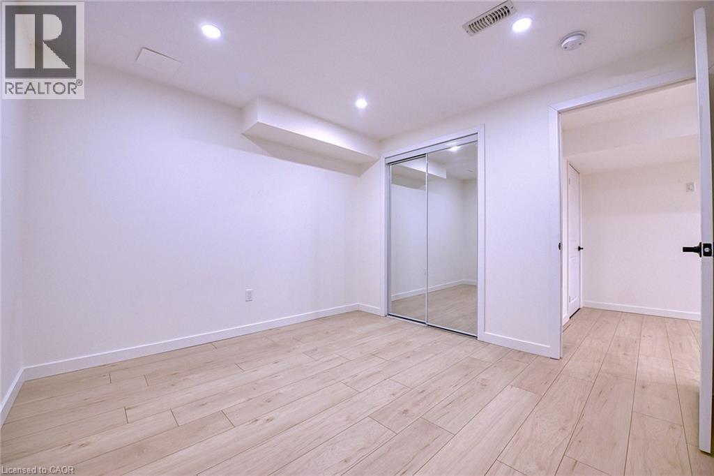 Basement - 130 Coopershawk Street, Kitchener, ON - Indoor Photo Showing Other Room