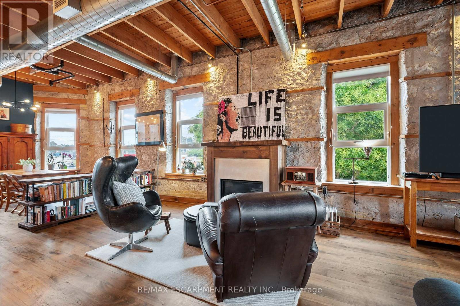201 - 25 Concession Street, Cambridge, ON - Indoor With Fireplace