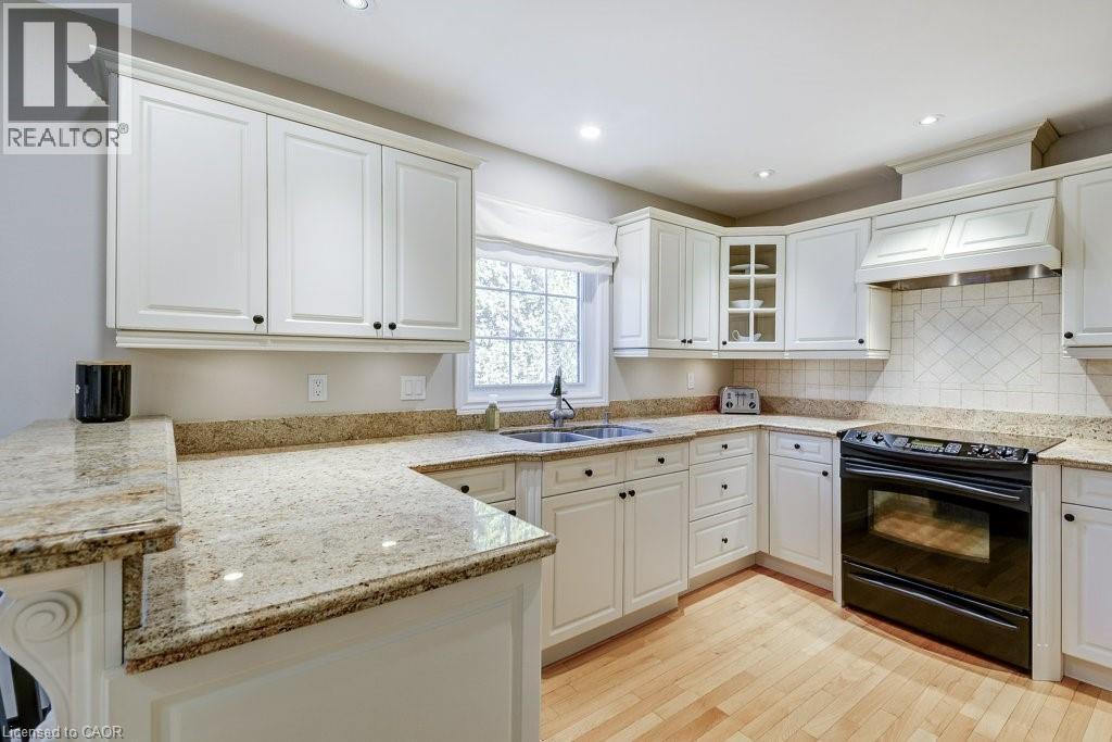2444 Butternut Crescent, Burlington, ON - Indoor Photo Showing Kitchen With Double Sink