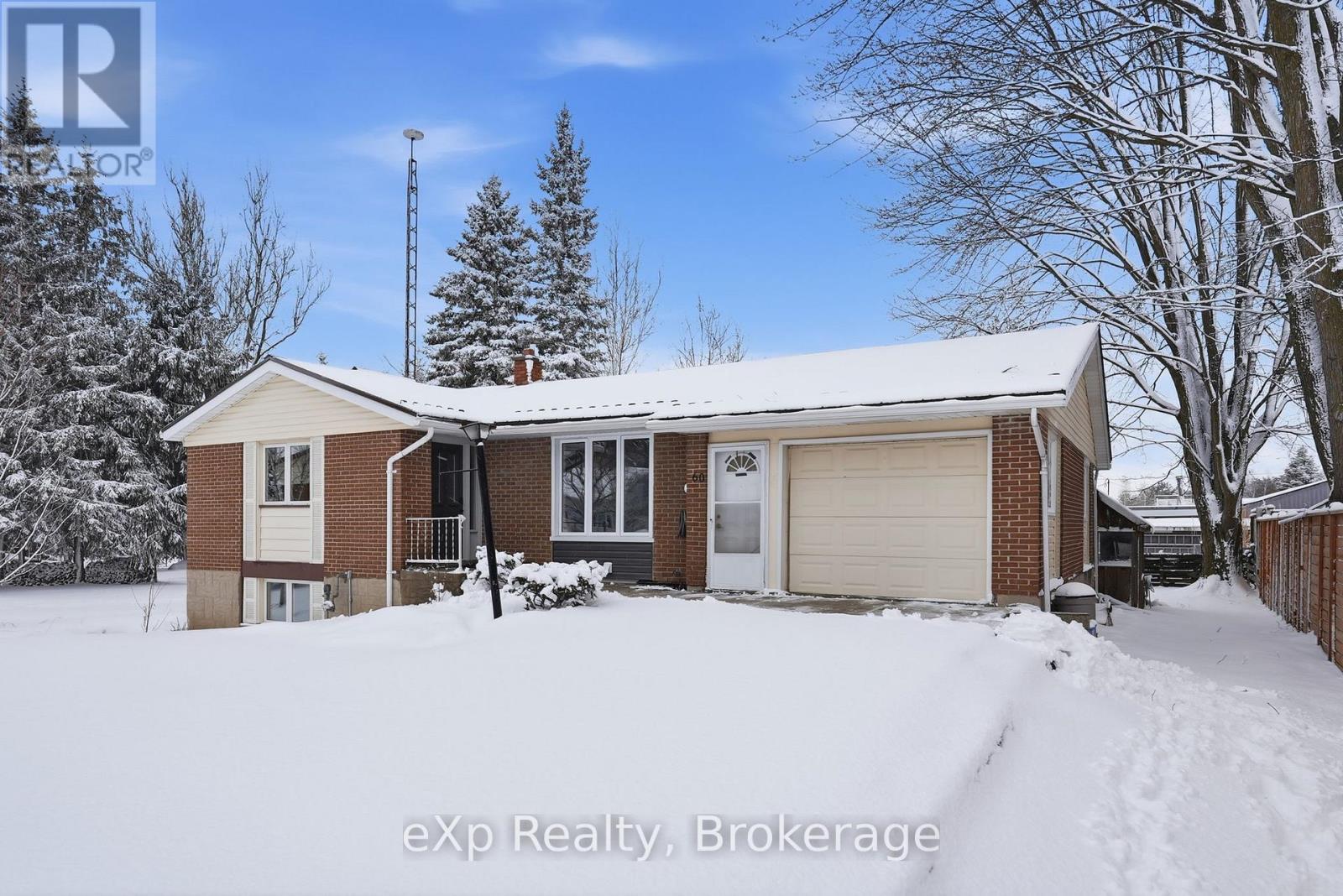 Front exterior view - 60 Main Street E, Mapleton, ON - Outdoor With Facade
