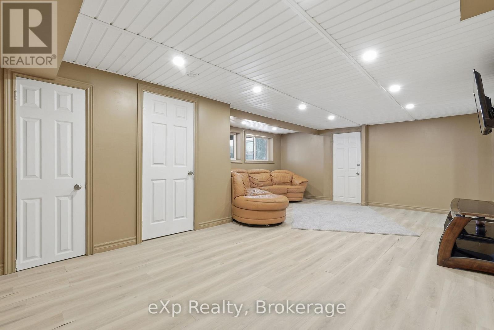 Rec room and closets - 60 Main Street E, Mapleton, ON - Indoor Photo Showing Basement