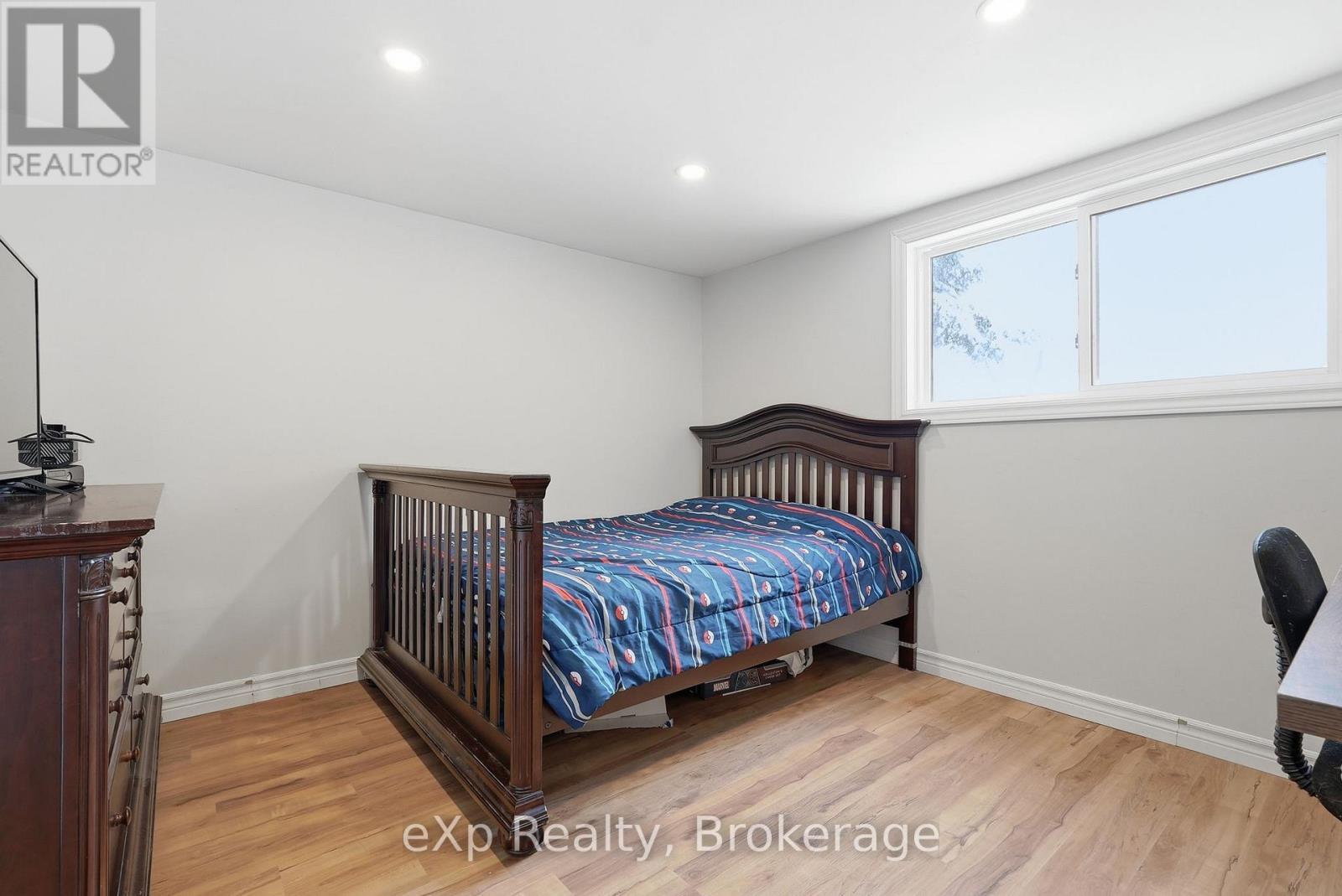 Basement bedroom backyard view - 60 Main Street E, Mapleton, ON - Indoor Photo Showing Bedroom