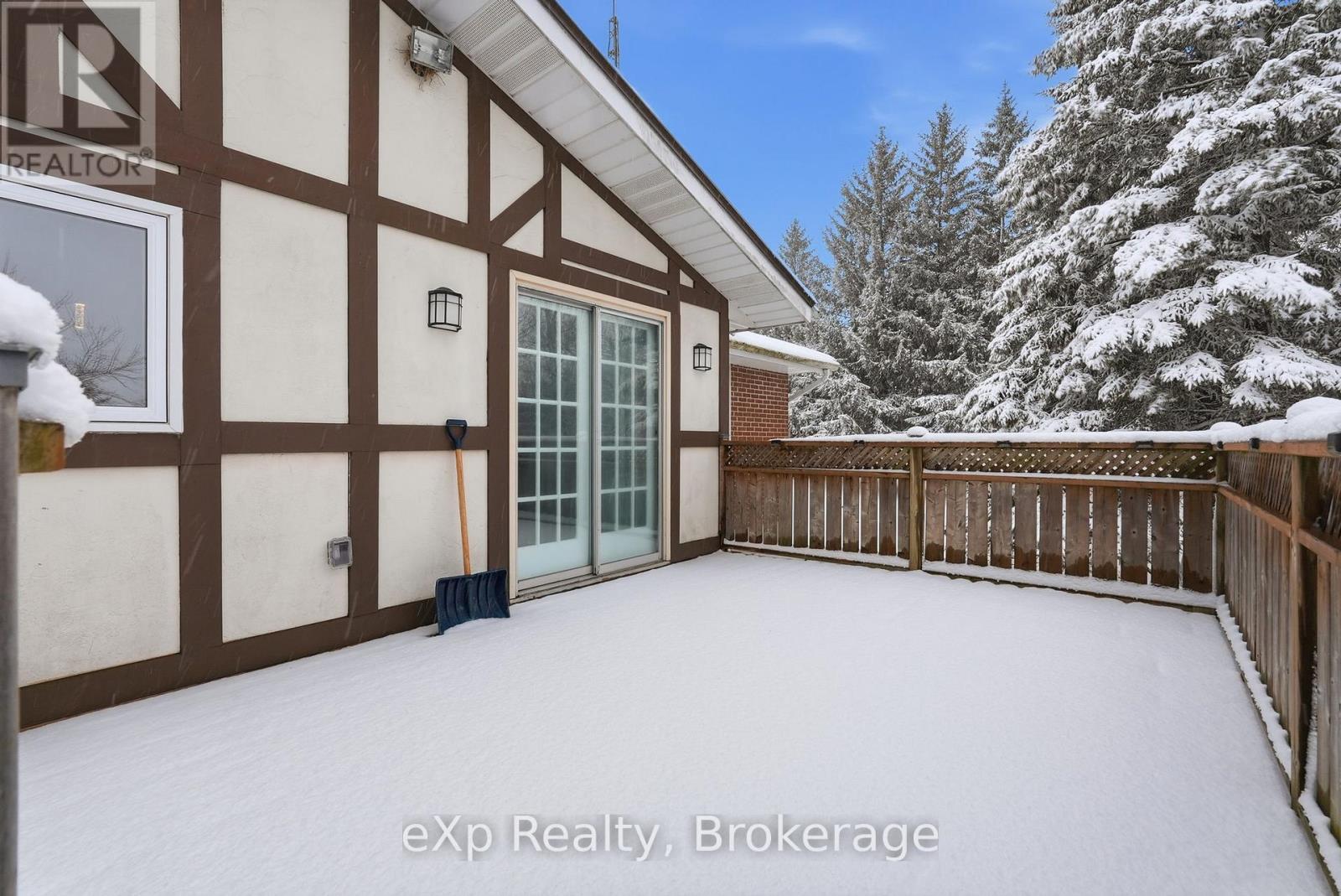 Back deck and exterior - 60 Main Street E, Mapleton, ON - Outdoor With Exterior