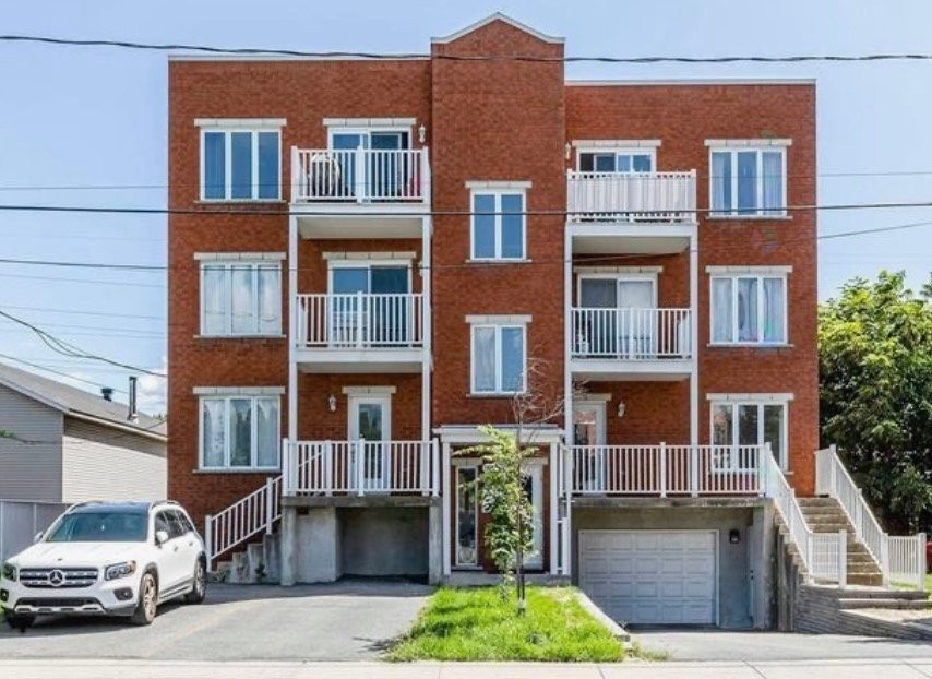 Front of Structure - 302-5565 Av. Albanie, Brossard, QC - Outdoor With Balcony With Facade
