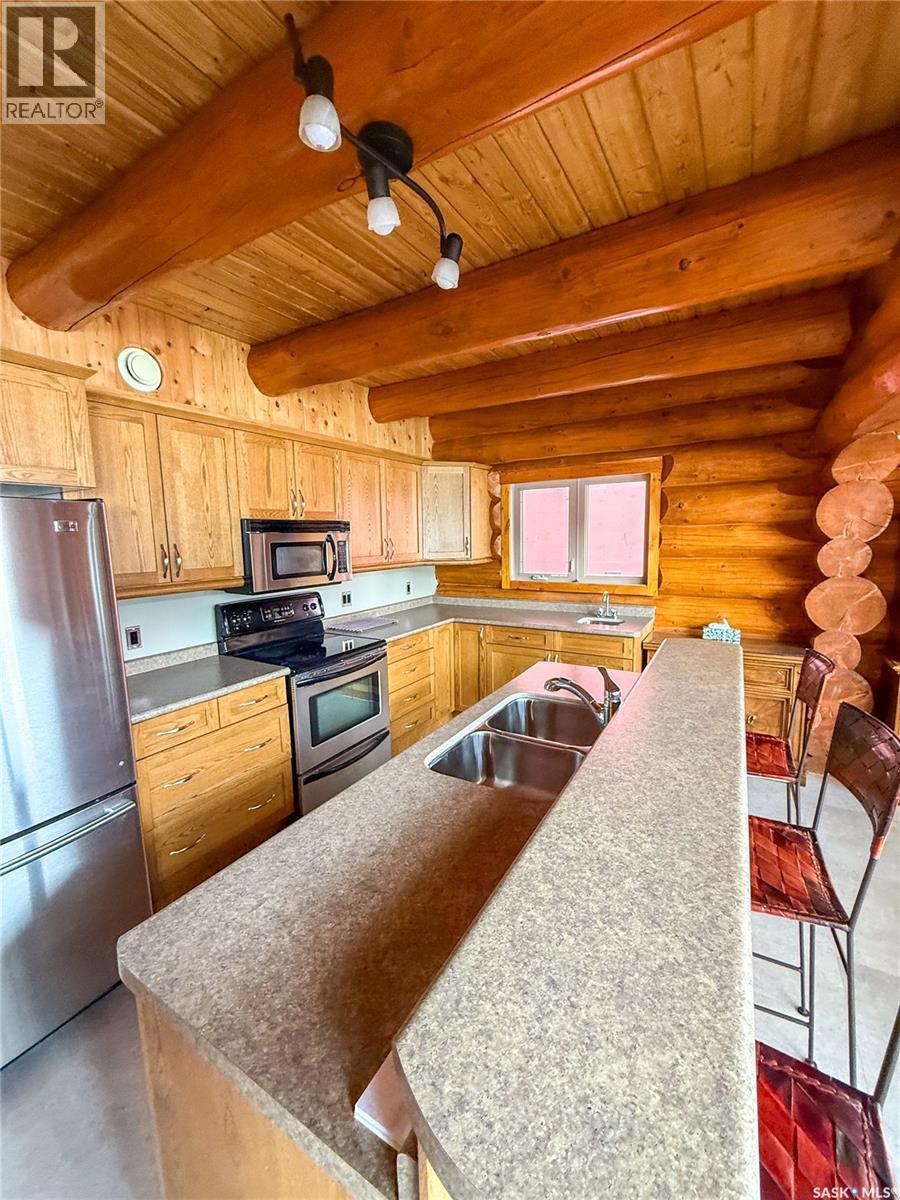 1512 Birch Drive, Turtle Lake, SK - Indoor Photo Showing Kitchen With Double Sink