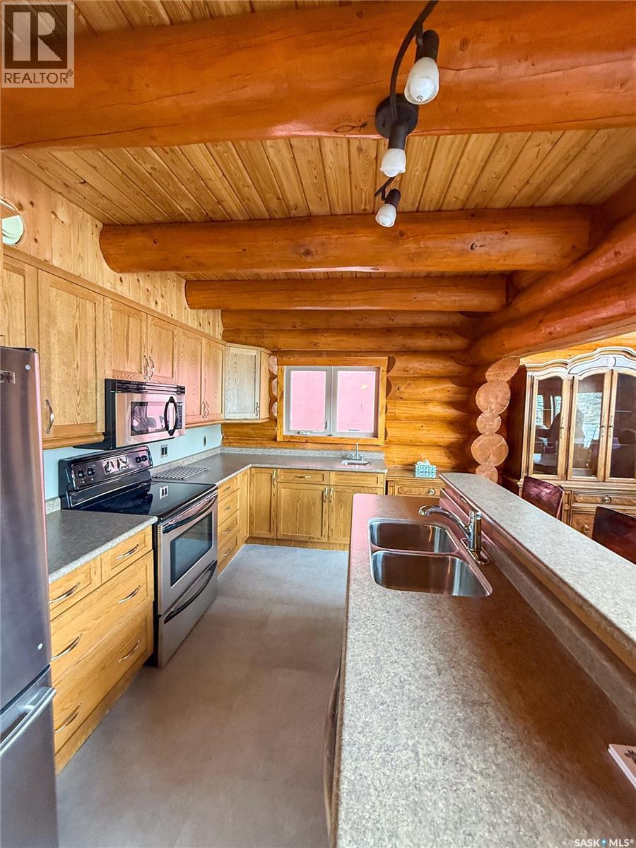 1512 Birch Drive, Turtle Lake, SK - Indoor Photo Showing Kitchen With Double Sink