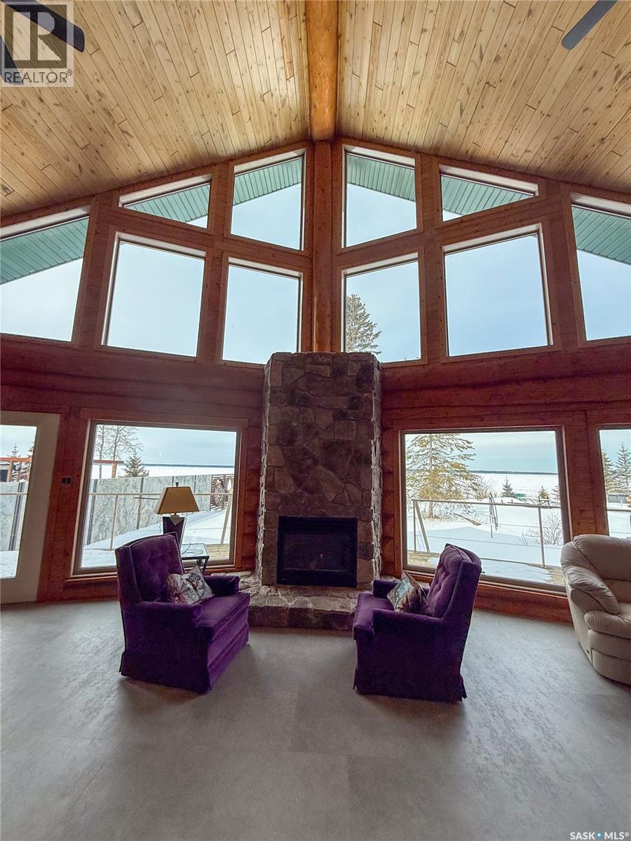 1512 Birch Drive, Turtle Lake, SK - Indoor Photo Showing Living Room With Fireplace