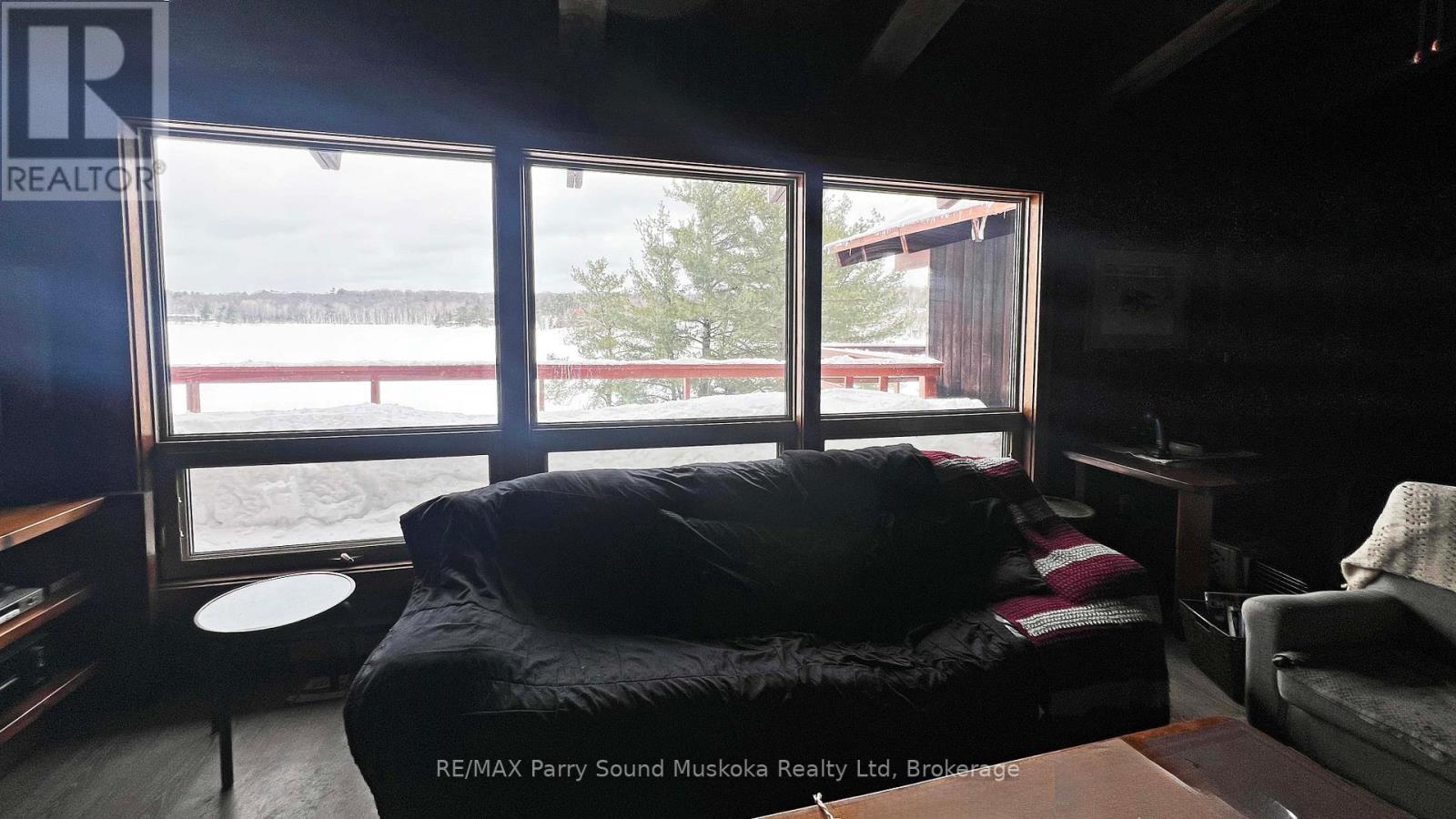 LR picture window viewing lake - 45 Ridgeway Drive, Carling, ON - Indoor
