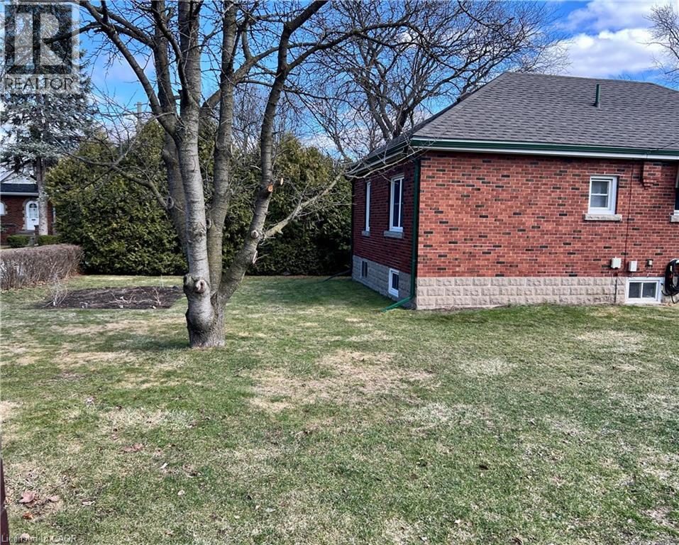 View of home's exterior and rear yard, - 90 Osler Drive, Dundas, ON - Outdoor