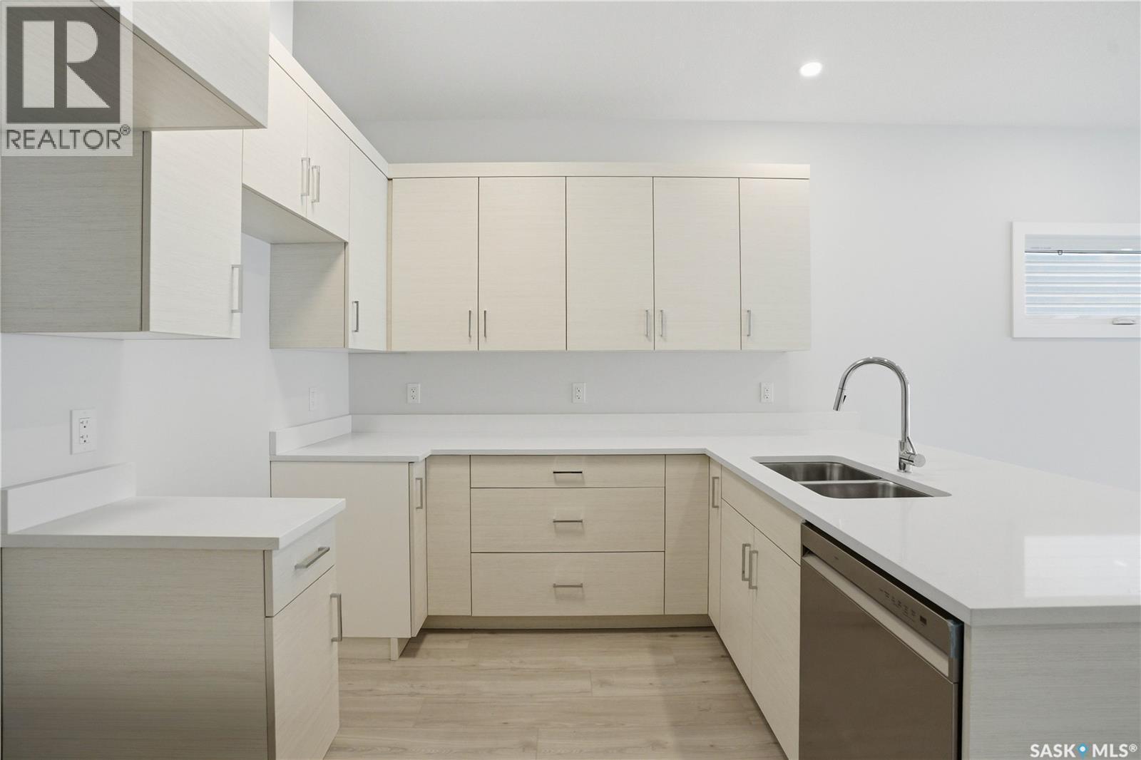 527 Sharma Crescent, Saskatoon, SK - Indoor Photo Showing Kitchen With Double Sink
