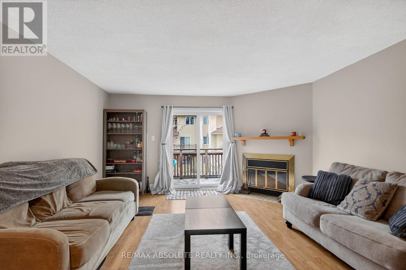 231 Harriot Private, Ottawa, ON - Indoor Photo Showing Living Room With Fireplace